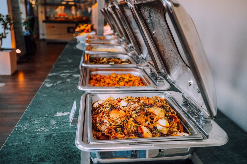 Menu 5 Bulk Catering Special &mdash; trays of hot food plated for a large function