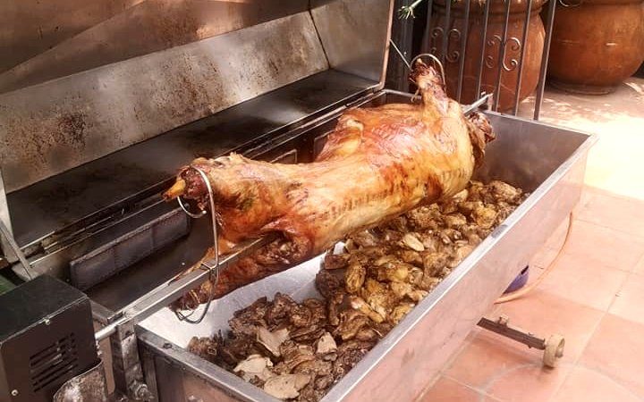 Menu 1 Whole Lamb spit braai, with vegetables roasting in the coals below