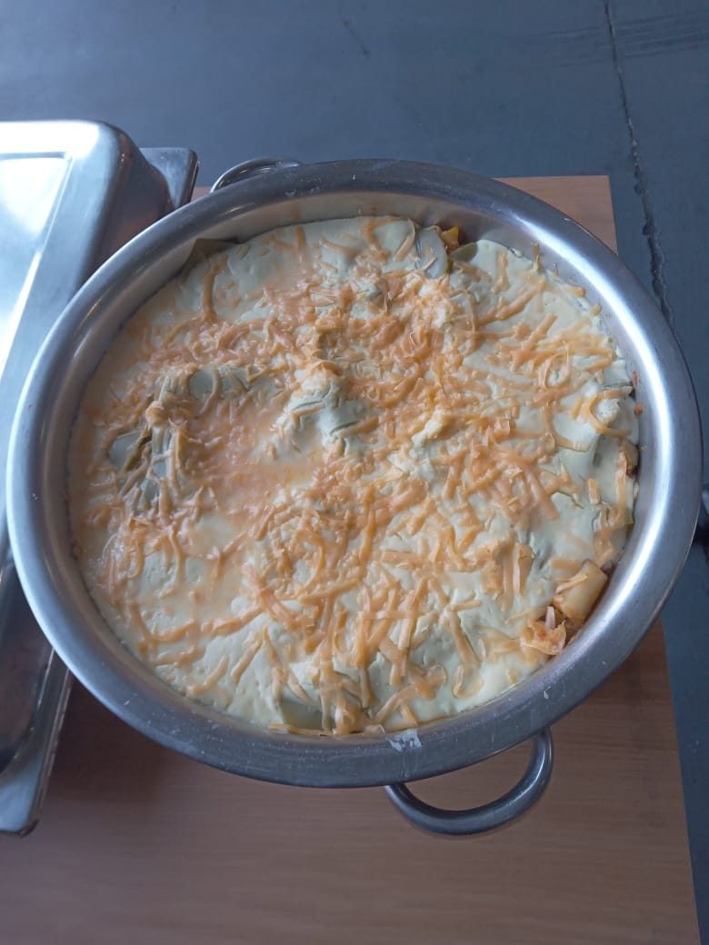 Creamy potato bake in the chafing dish, ready to serve at a function